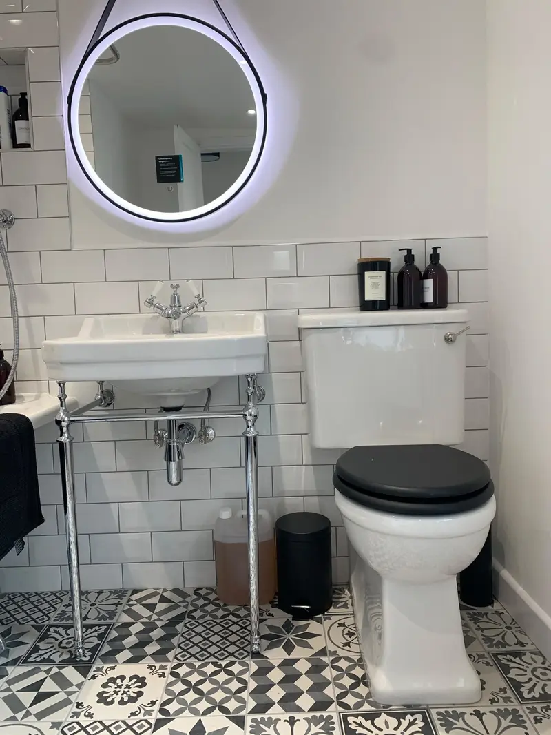 Completed bathroom installation by C Hobbs Plumbing and Heating in Buckinghamshire: tiling, sanitaryware and fitted brassware