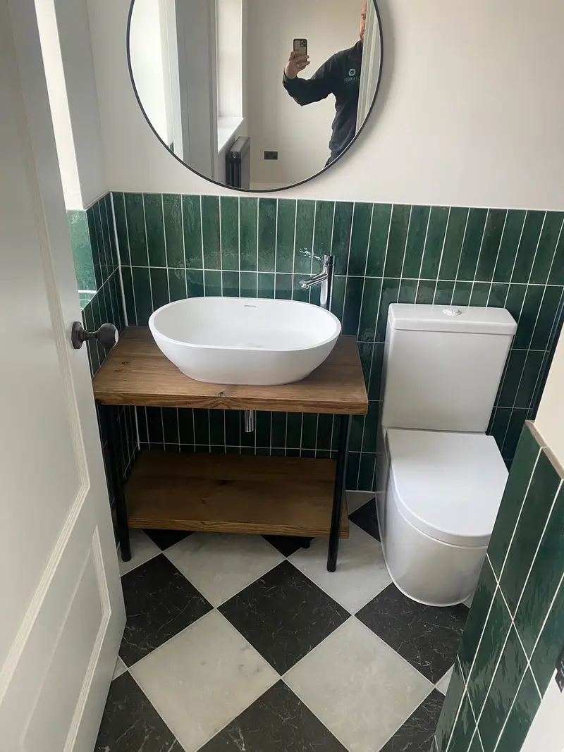 Completed bathroom installation by C Hobbs Plumbing and Heating in Hertfordshire: tiling, sanitaryware and fitted brassware