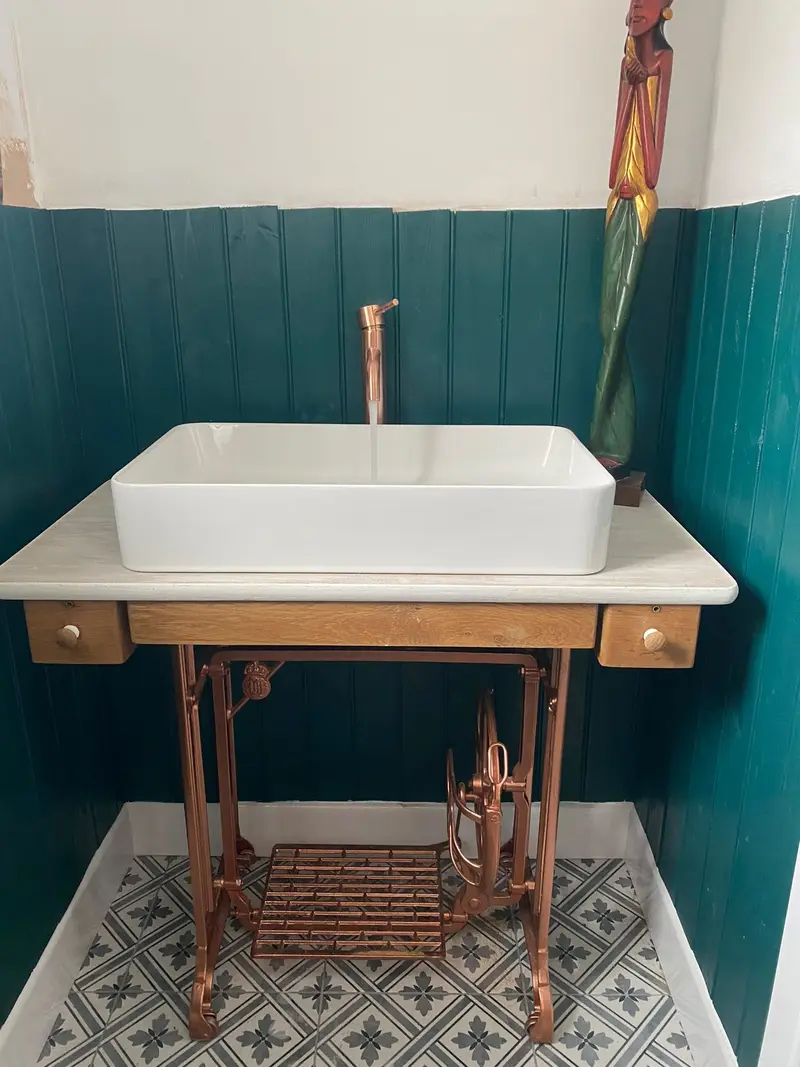 Completed bathroom installation by C Hobbs Plumbing and Heating in Bedford: tiling, sanitaryware and fitted brassware
