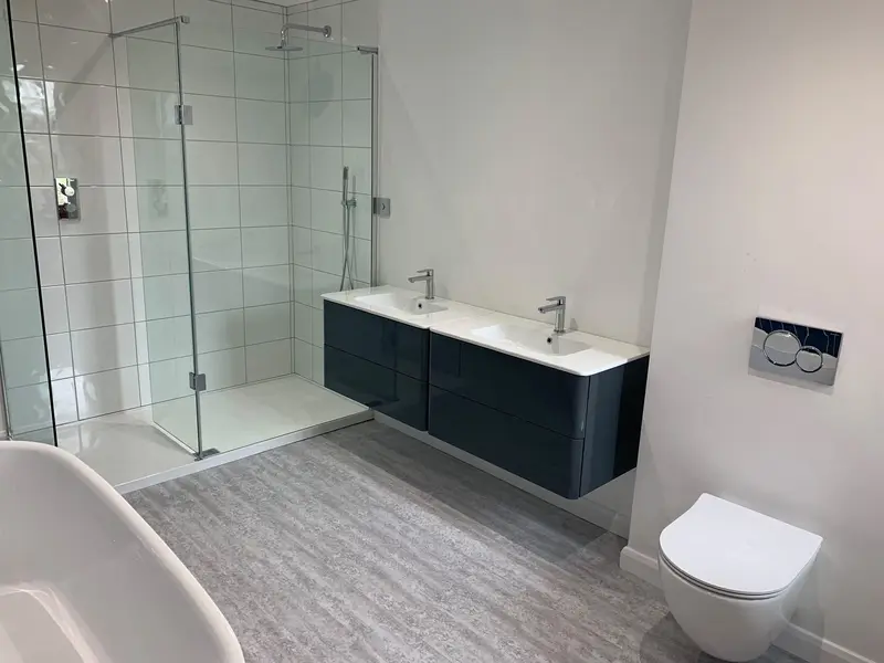 Completed bathroom installation by C Hobbs Plumbing and Heating in Bedford: tiling, sanitaryware and fitted brassware