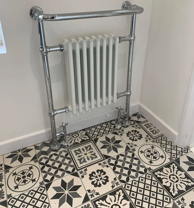 Completed bathroom installation by C Hobbs Plumbing and Heating in Bedfordshire: tiling, sanitaryware and fitted brassware