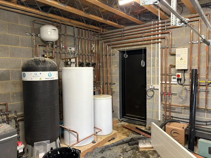 Large hot water cylinders and heating distribution pipework installed by C Hobbs Plumbing and Heating in Dunstable