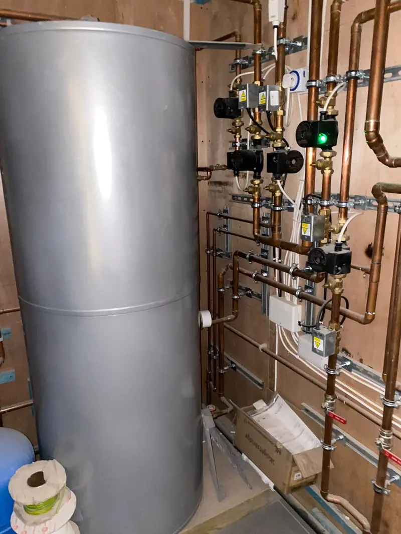 Hot water cylinder with heating circulation pumps installed by C Hobbs Plumbing and Heating in St Albans