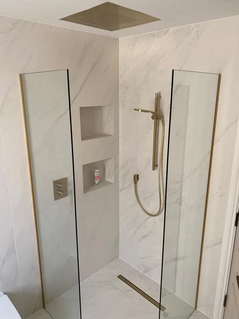 Completed bathroom installation by C Hobbs Plumbing and Heating in Buckinghamshire: tiling, sanitaryware and fitted brassware