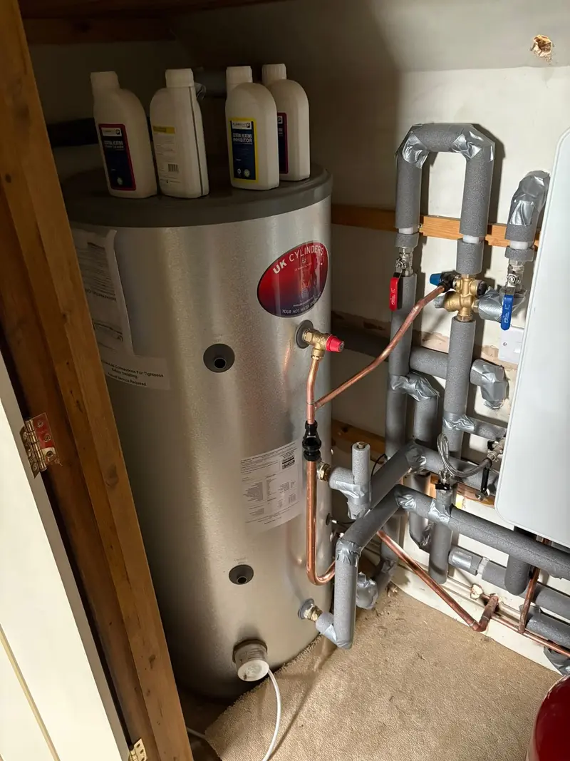 Unvented hot water cylinder installation with insulated pipework by C Hobbs Plumbing and Heating in St Albans