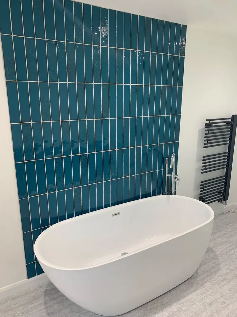 Completed bathroom installation by C Hobbs Plumbing and Heating in Bedfordshire: tiling, sanitaryware and fitted brassware