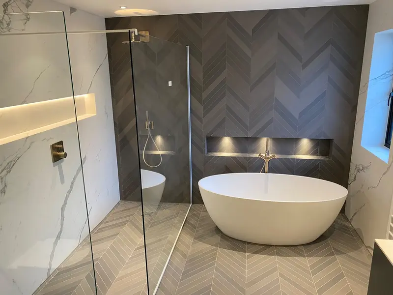 Completed bathroom installation by C Hobbs Plumbing and Heating in Luton: tiling, sanitaryware and fitted brassware