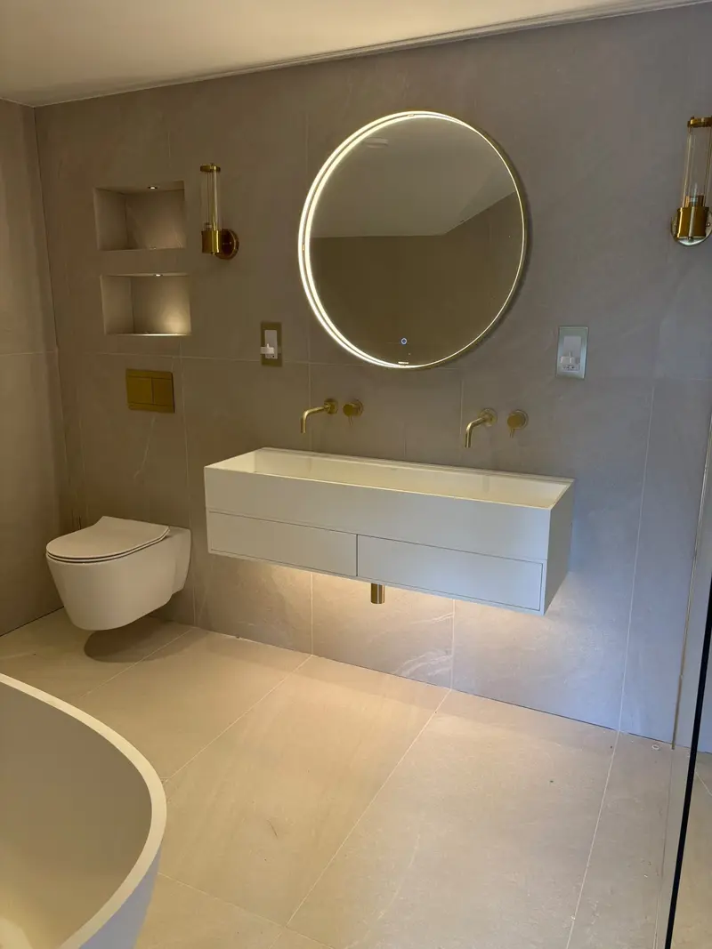 Completed bathroom installation by C Hobbs Plumbing and Heating in Bedfordshire: tiling, sanitaryware and fitted brassware