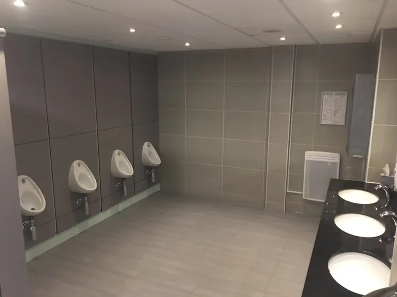 Completed bathroom installation by C Hobbs Plumbing and Heating in St Albans: tiling, sanitaryware and fitted brassware