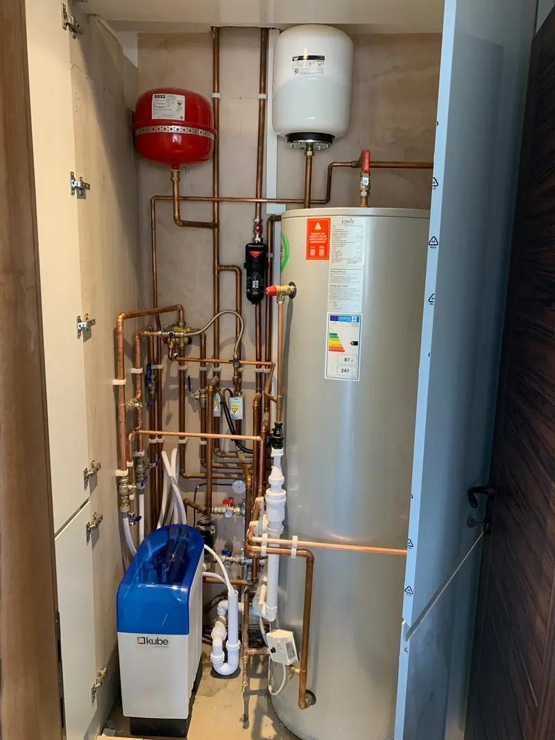 Hot water cylinder, water softener and copper pipework installed by C Hobbs Plumbing and Heating in Buckinghamshire