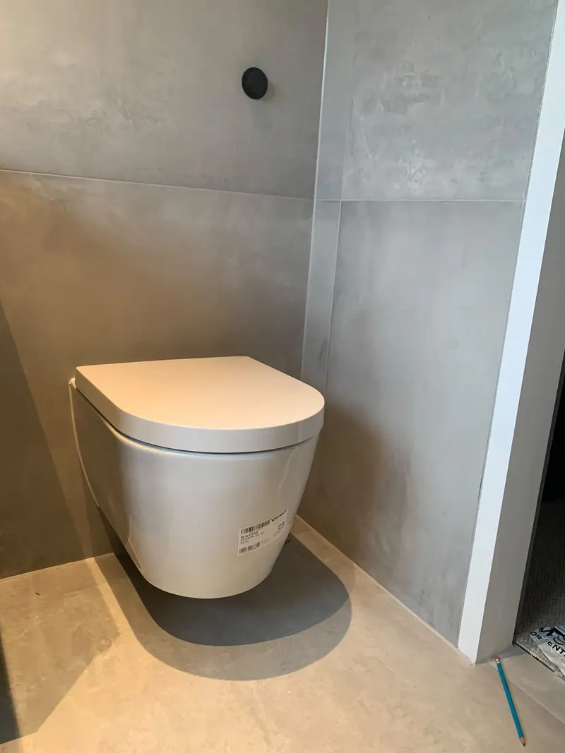 Completed bathroom installation by C Hobbs Plumbing and Heating in Buckinghamshire: tiling, sanitaryware and fitted brassware