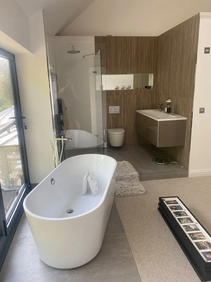 Completed bathroom installation by C Hobbs Plumbing and Heating in Buckinghamshire: tiling, sanitaryware and fitted brassware