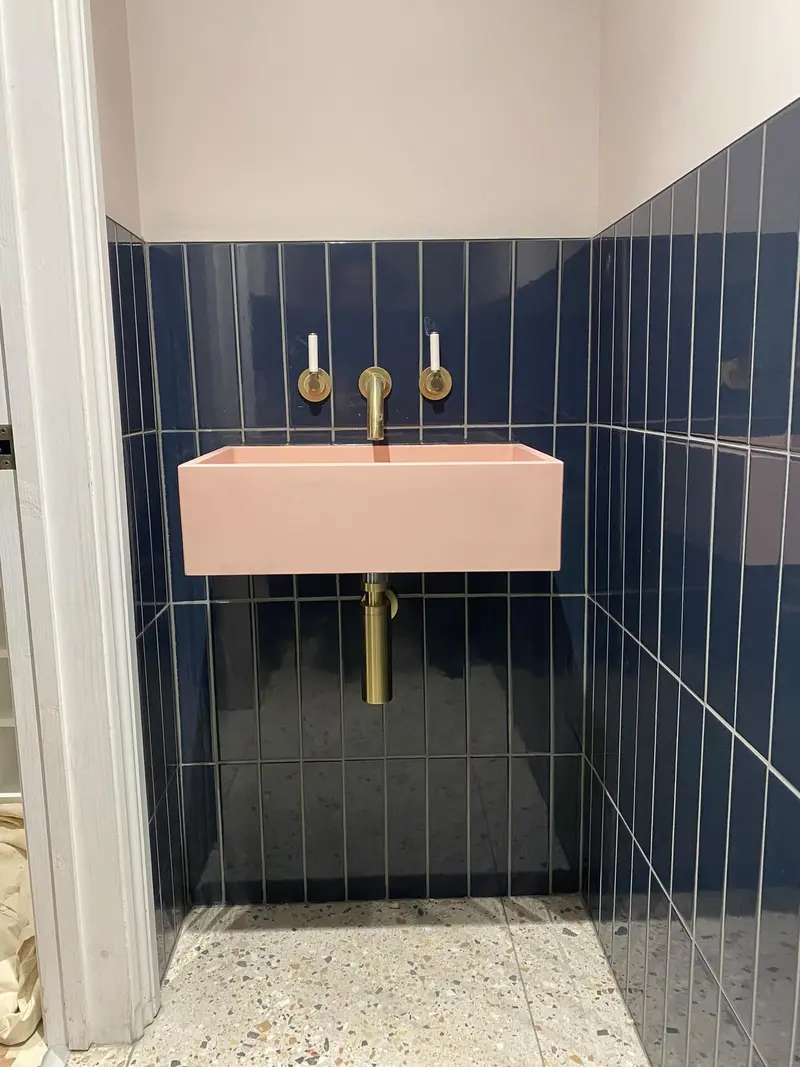 Completed bathroom installation by C Hobbs Plumbing and Heating in Harpenden: tiling, sanitaryware and fitted brassware